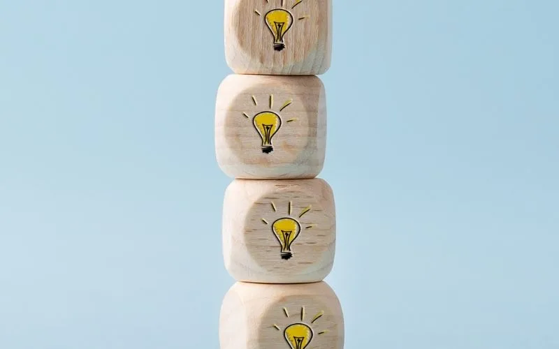 Blocks with a lightbulb icon stacked on top of each other