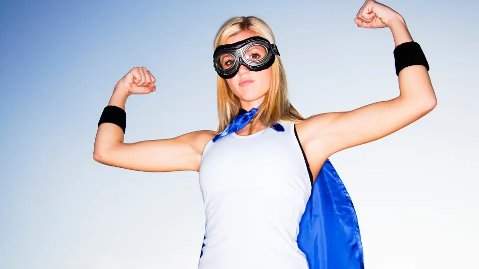 woman posing as superhero