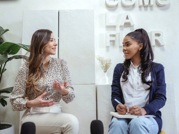career women speaking with each other